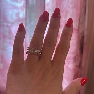 Elegant Silver Crossover Ring